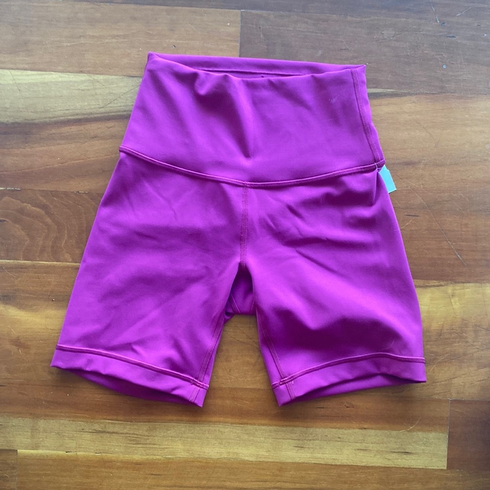 Lululemon Wunder train high rise shorts. Color is Magenta Purple in size 2